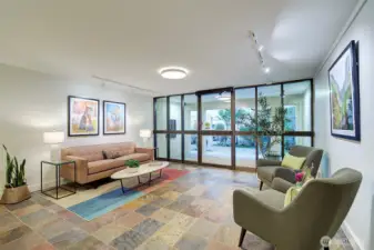 Lovely lobby. Elevator to unit on this floor. No steps to get into this building!