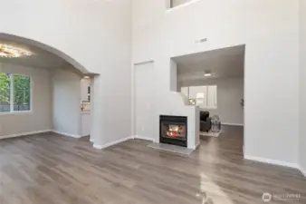 The residence features newly installed engineered flooring in all areas.