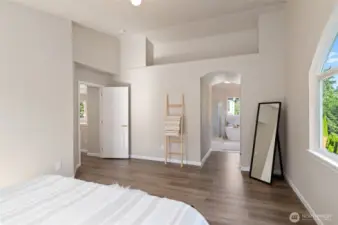 The primary suite features two closets, providing ample storage space for all personal belongings.
