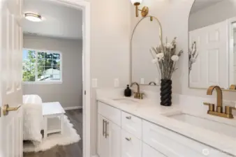 Shared bathroom accessible from two separate bedrooms, shower and bathtub.