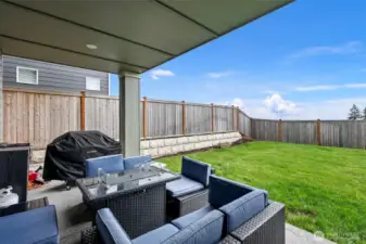 Enjoy the flat yard with sprinker system and the view!
