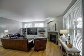 Family room with cozy gas fireplace.