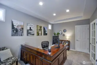 Main floor office with French doors. It could also double as a bedroom.