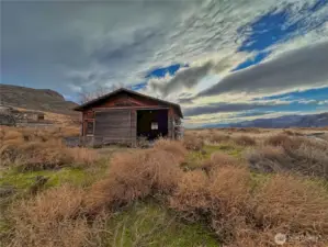 Outbuilding at bottom corner of property