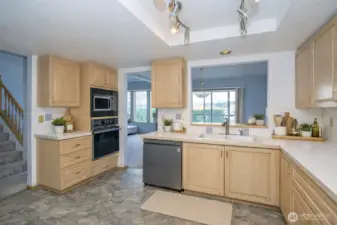 Bright kitchen overlooking the dining and living areas, perfect for entertaining.