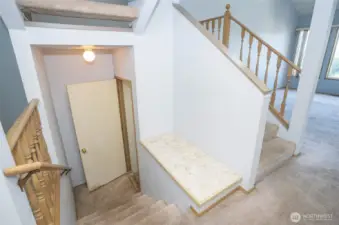 Downstairs to the lower level with family room, fourth bedroom, and full bath.