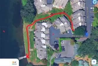 Path leading from the condo unit to the shared Lake Steilacoom dock.