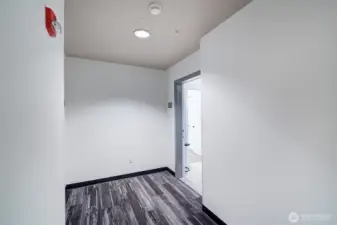 Peaceful and quiet living at the end of the hallway. means.