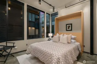 Third bedroom with murphy bed & ensuite bath.