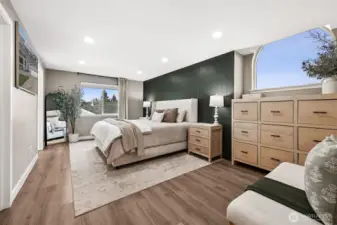 Fall in love with the primary suite with thought put into the warm neutral colors only to be off set by the natural lighting flooding the windows. This home offers new sound dampening windows throughout just installed in 2024.