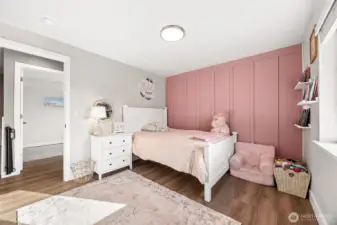Nice sized bedroom #3 with accent wall & plenty of natural lighting.
