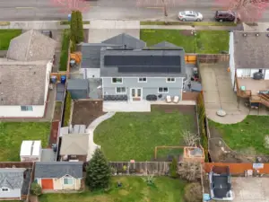 Great view of the backyard and the 13.2 KW solar panel system. Not seen in this photo is the French drain system that was installed in the backyard to increase drainage.
