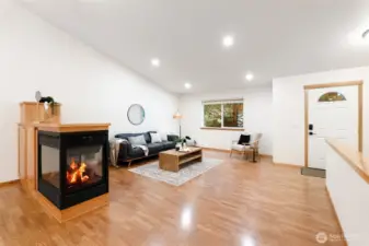 Spacious living room with cozy gas fireplace, a great place to gather!