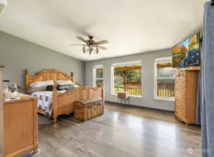 This is the primary suite that you've been waiting for! Full of light with a serene view and a connected bonus room/den for convenience and privacy.