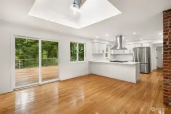 Without the virtual staging, you can visualize the other options for this space, as perhaps you’d rather create a lounging reading zone or gaming center, as the high new lighting in the skylight alcove gives you enough clearance to use this space as you like.