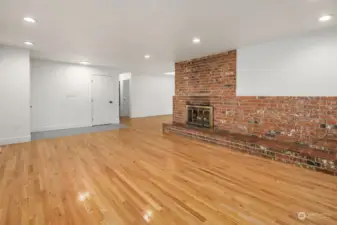 Extra seating is to be had on the extended hearth of the main floor living room fireplace. It’s perfect when entertaining or during the holidays!