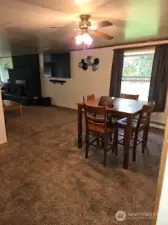 Dining room showing the family room on the left