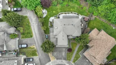 This airy home offers plenty of yard space, ample living areas, a partially fenced property, and a large driveway for all your parking needs