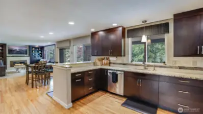 Bathed in natural light, this kitchen flows naturally into the dining area and living room—creating an open, inviting space perfect for cooking, dining, and relaxing together
