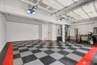 basement garage with large workshop area...