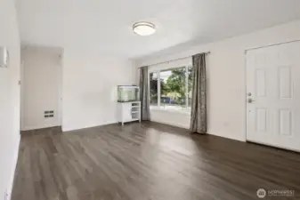 Welcome in to the bright and fresh living room. Brand new laminate flooring throughout the whole house for easy maintenance.