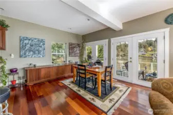 7 sets of french doors lead out to the deck, and beach area..