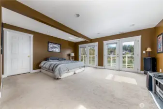Large main suite up, with full bathroom & private deck. **New carpet has just been installed.