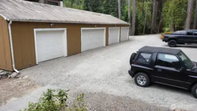 6 car, 4 Bay detached garage off front driveway.