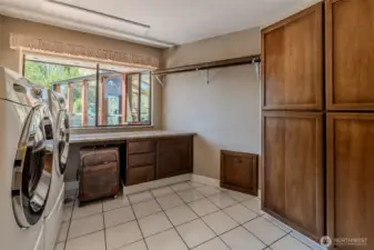 Laundry room on main level with laundry drawer attached to primary bedroom