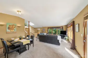 The easy-flow floor plan makes for great entertaining or daily living, plus larger or smaller dining room arrangements. Vaulted ceilings create light and space year round.
