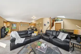 The great room space handles large , comfy reclining or your vision of a living space.  Plush, neutral tone carpets were added in the last few years.  Ask your agent for the upgrade date sheet in the supplements section.