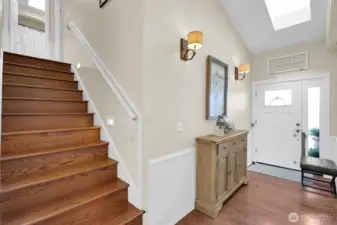 Upstairs leads to: 1 full bathroom + 2 bedrooms + primary bedroom with 3/4 bath.