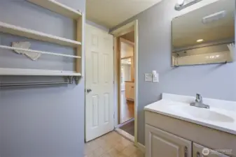 While the bathroom is an en suite to the bedroom, it also has this door for use from the kitchen/office without having to access the bedroom (nice for privacy with guests!)