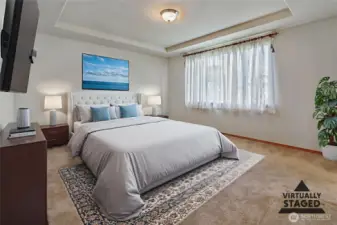 Virtually staged primary bedroom.