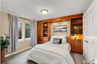 This awesome room has a built-in murphy bed with a pull down desk and added storage.