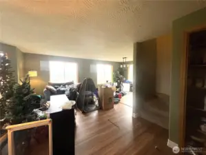 living room looking twards the front door and family room