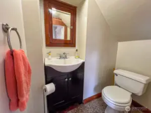Half-bath under the stairs off of parlor.