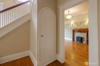 Charming coved coat closet.