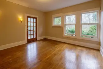 Studio upstairs with a separate entrance, kitchenette, storage cabinetry, and full bath overlooks the backyard. Offering built-in closets, it would be an additional bedroom/sleeping space as well.