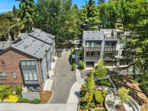 This townhome community offers convenient garage access and beautifully maintained grounds that elevate the neighborhood’s charm.