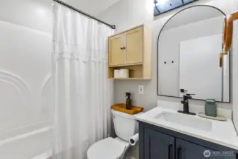 Fully renovated bathroom with quartz vanity& tub-shower combo.