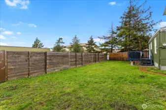 Level lawn area is a blank slate - make it your own!