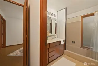 Bathroom showcases a clean, contemporary feel.