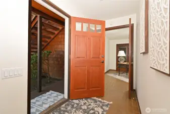 Entry welcomes you, providing an open feel as you step inside.