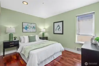 Quiet and calming, the bedroom offers a perfect escape with soft light and clean lines.