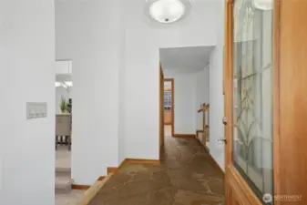 Open and Vaulted main level entrance with slate floors.