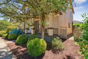 Gate takes you to side yard and back around to back patio off of kitchen and alleyway garage access.