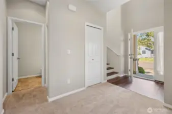 Just off the entrance is a 1/2 bath and deep closet.