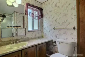 A lovely full main bath services second bedroom as well as your guests.