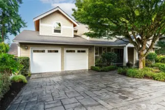Impressive on approach, stamped concrete driveway and  walkway, offering cobblestone feel